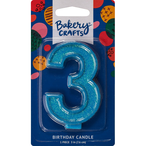 Glittery blue number three 3" birthday candle in packaging from Bakery Crafts.
