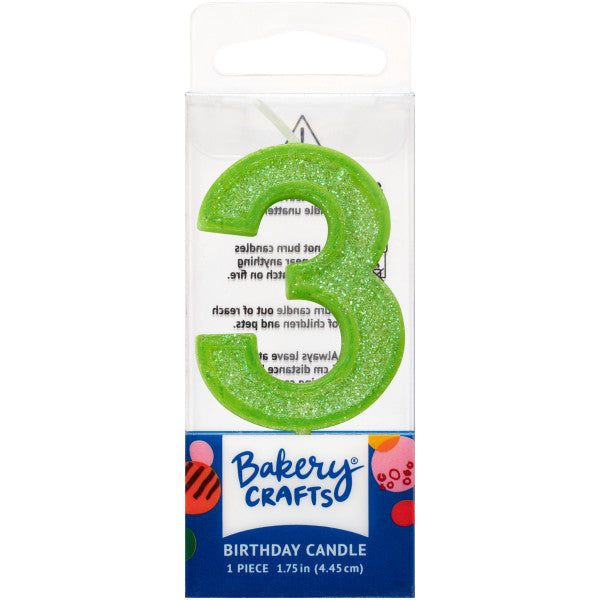 Glittery lime number three 1.75" birthday candle in packaging from Bakery Crafts.