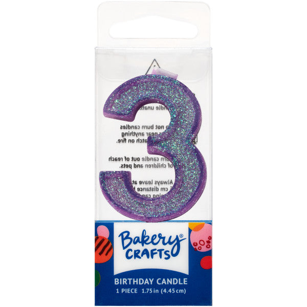 Glittery purple number three 1.75" birthday candle in packaging from Bakery Crafts.