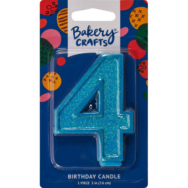 Glittery blue number four 3" birthday candle in packaging from Bakery Crafts.