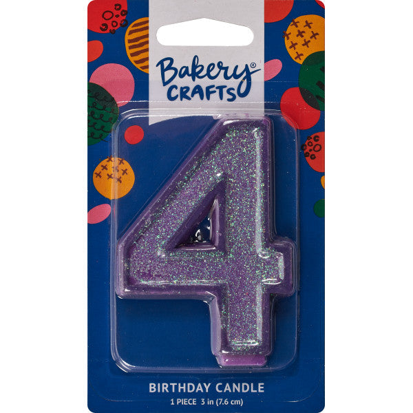 Glittery purple number four 3" birthday candle in packaging from Bakery Crafts.