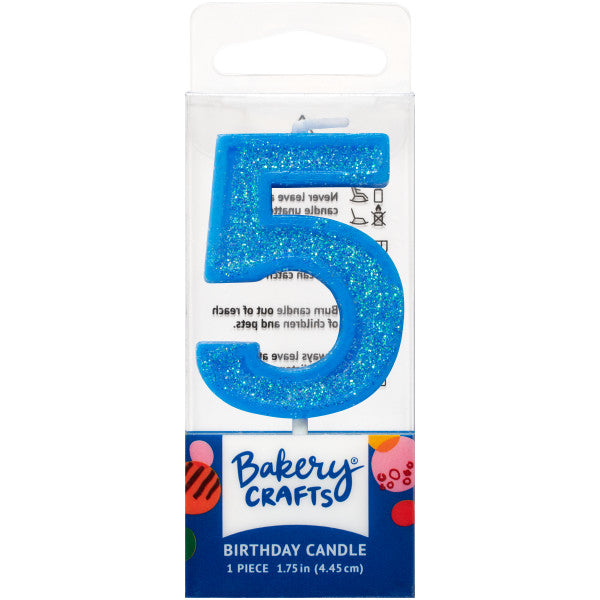 Glittery blue number five 1.75" birthday candle in packaging from Bakery Crafts.