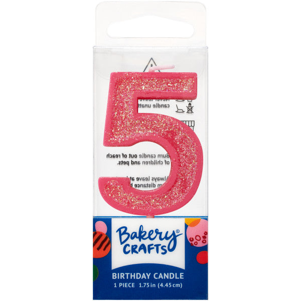Glittery pink number five 1.75" birthday candle in packaging from Bakery Crafts.