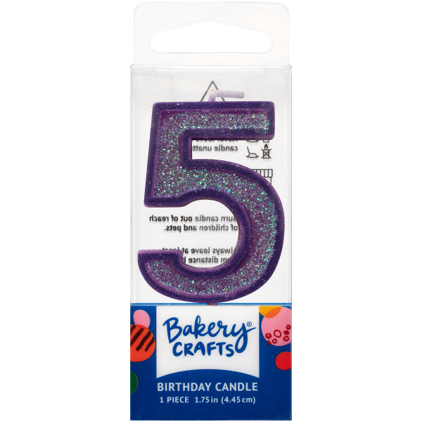 Glittery purple number five 1.75" birthday candle in packaging from Bakery Crafts.