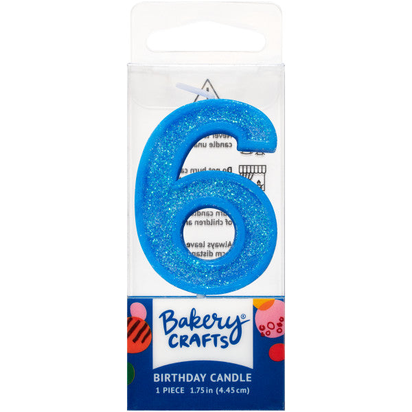 Glittery blue number six 1.75" birthday candle in packaging from Bakery Crafts.