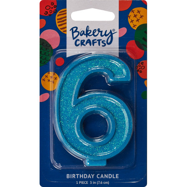 Glittery blue number six 3" birthday candle in packaging from Bakery Crafts.