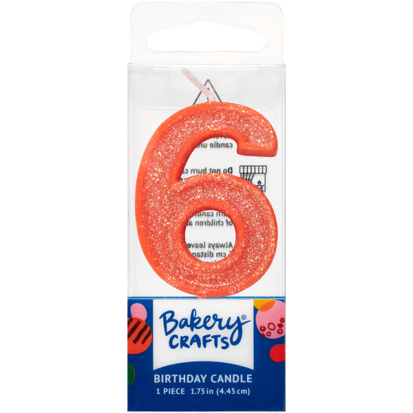 Glittery orange number six 1.75" birthday candle in packaging from Bakery Crafts.