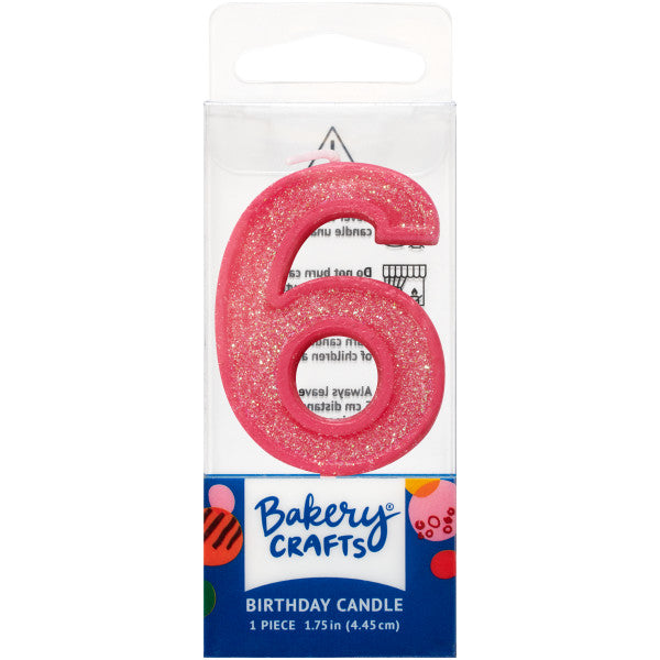 Glittery pink number six 1.75" birthday candle in packaging from Bakery Crafts.