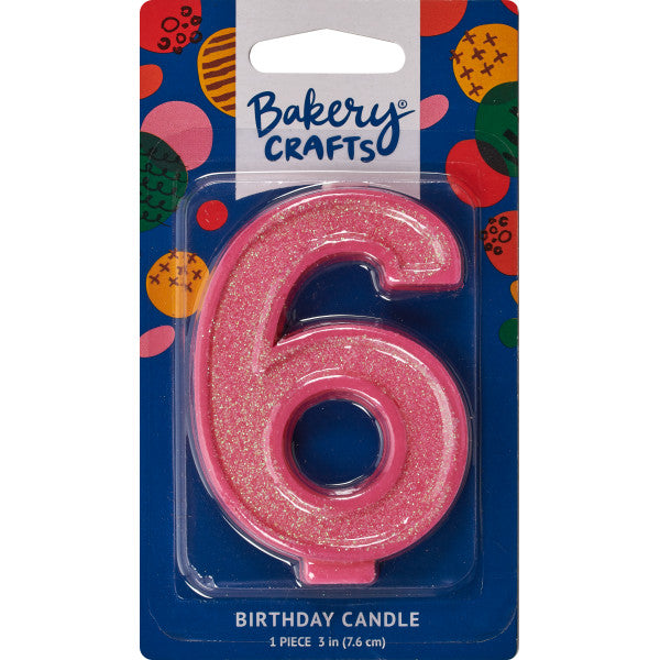 Glittery pink number six 3" birthday candle in packaging from Bakery Crafts.