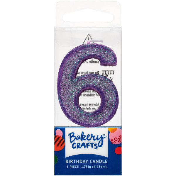 Glittery purple number six 1.75" birthday candle in packaging from Bakery Crafts.