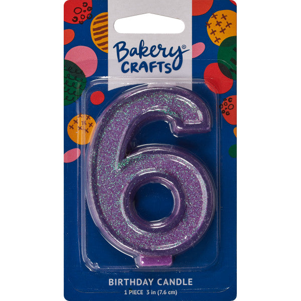 Glittery purple number six 3" birthday candle in packaging from Bakery Crafts.