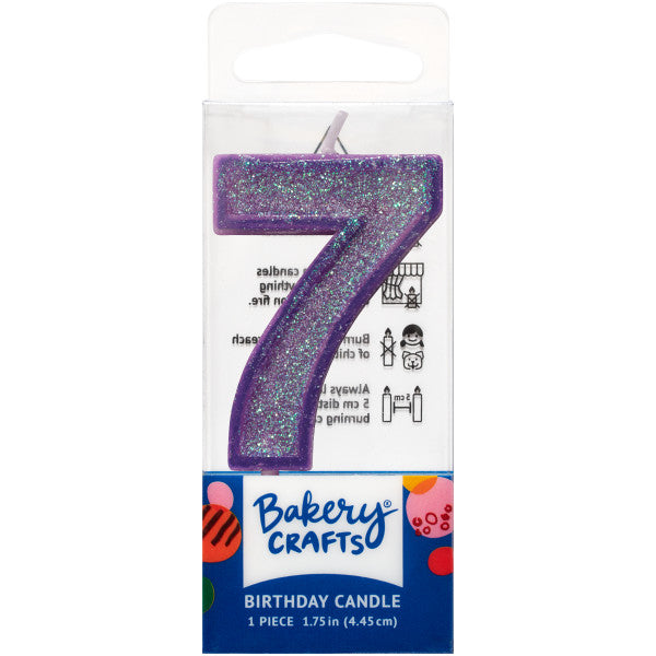 Glittery purple number seven 1.75" birthday candle in packaging from Bakery Crafts.