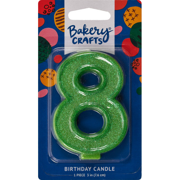 Glittery green number eight 3" birthday candle in packaging from Bakery Crafts.