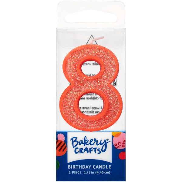 Glittery orange number eight 1.75" birthday candle in packaging from Bakery Crafts.