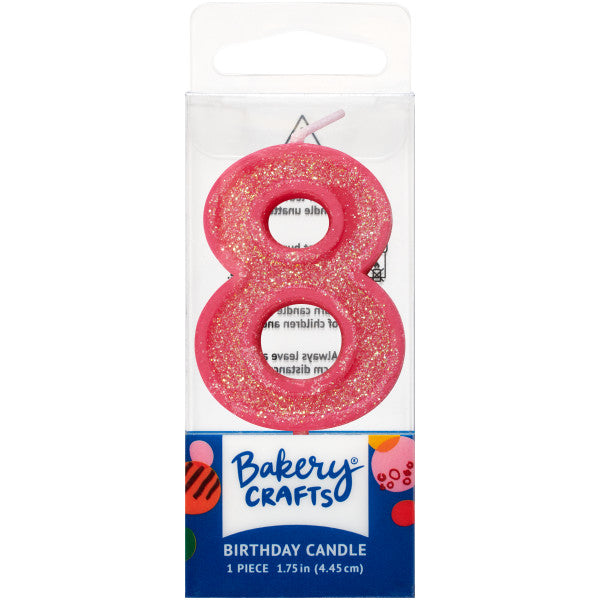 Glittery pink number eight 1.75" birthday candle in packaging from Bakery Crafts.