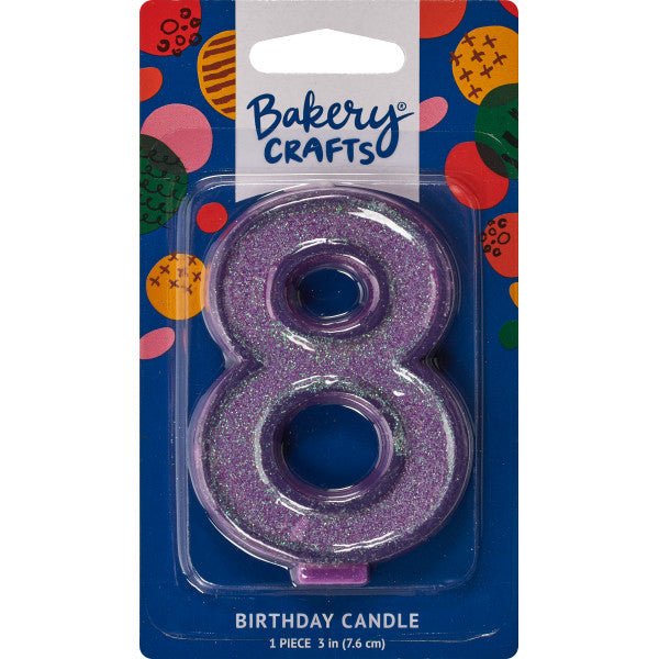 Glittery purple number eight 3" birthday candle in packaging from Bakery Crafts.