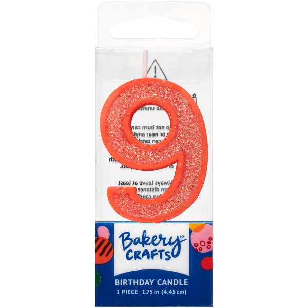 Glittery orange number nine 1.75" birthday candle in packaging from Bakery Crafts.