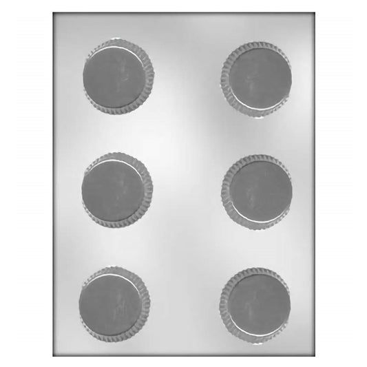 Large round peanut butter cup chocolate mold with scalloped edges, designed for making sizable and delicious candy treats.
