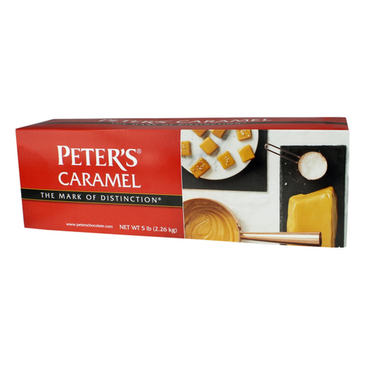Box of Peter's Caramel, featuring a red label with branding and images of caramel cubes, melted caramel, and caramel being worked with utensils; product weighs 5 lb (2.26 kg).