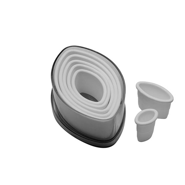 Ateco 5755 7-piece plain football cutter set, featuring white plastic football-shaped cutters neatly nested inside a matching storage container.
