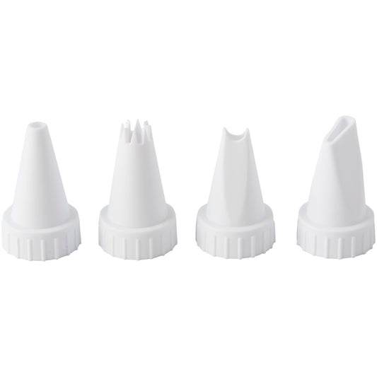 Set of four white plastic piping tips for decorating cakes and cupcakes, including round, star, leaf, and petal shapes.