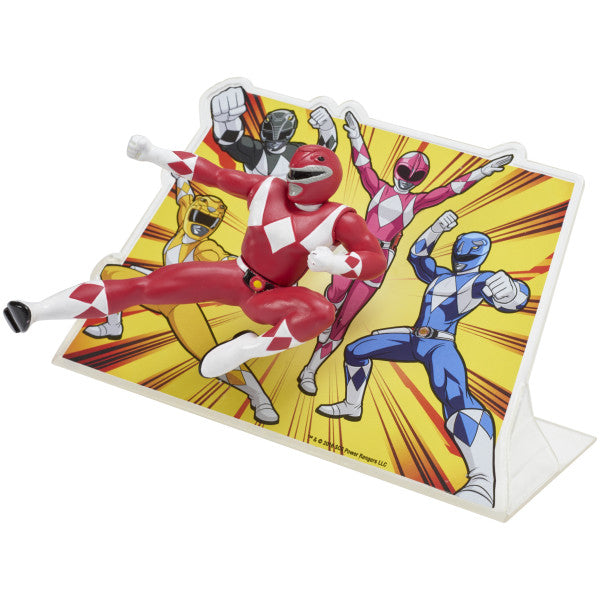 Close-up of Red Ranger cake topper with 3D figurine in front of illustrated Power Rangers background.