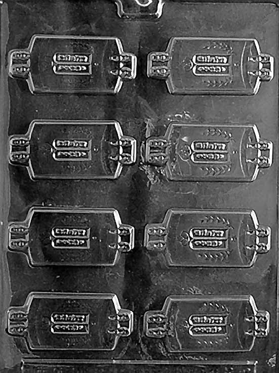 R049 TORAH SCROLL & MANTLE chocolate mold with cavity depicting Torah scroll wrapped in mantle.