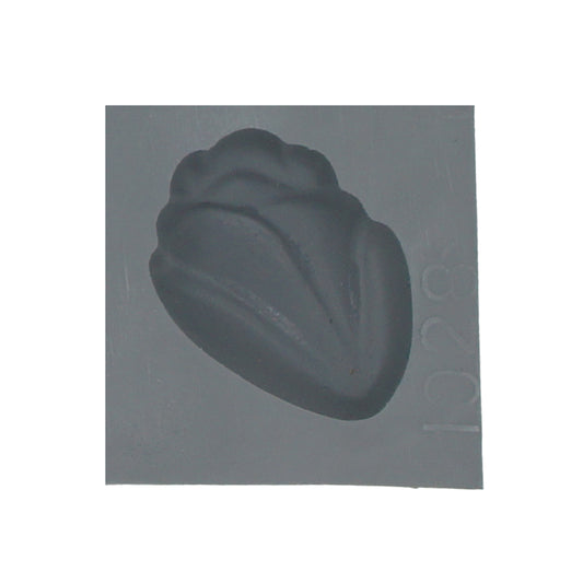 Close-up of single rosebud cavity in rubber mint mold with detailed floral shape