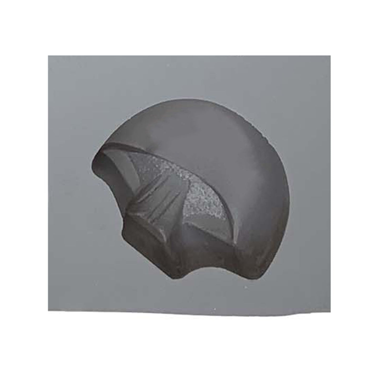 Close-up of a mushroom-shaped rubber mint mold cavity, featuring a rounded cap and defined gill lines for detail.