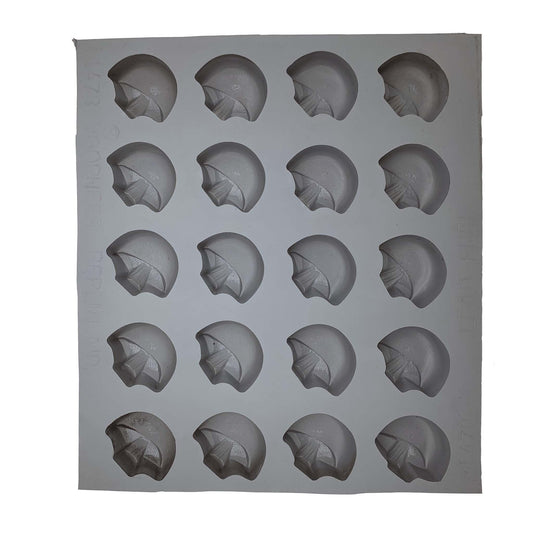 Full sheet of 20 mushroom-shaped rubber mint mold cavities arranged in a 6x4 grid, designed for cream cheese mints and candy making.