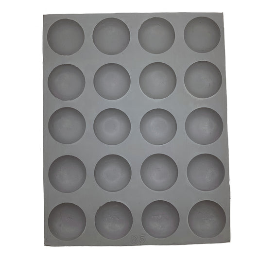 Full sheet of 20 half-sphere rubber mint mold cavities, perfect for creating smooth, round candies or dessert components.