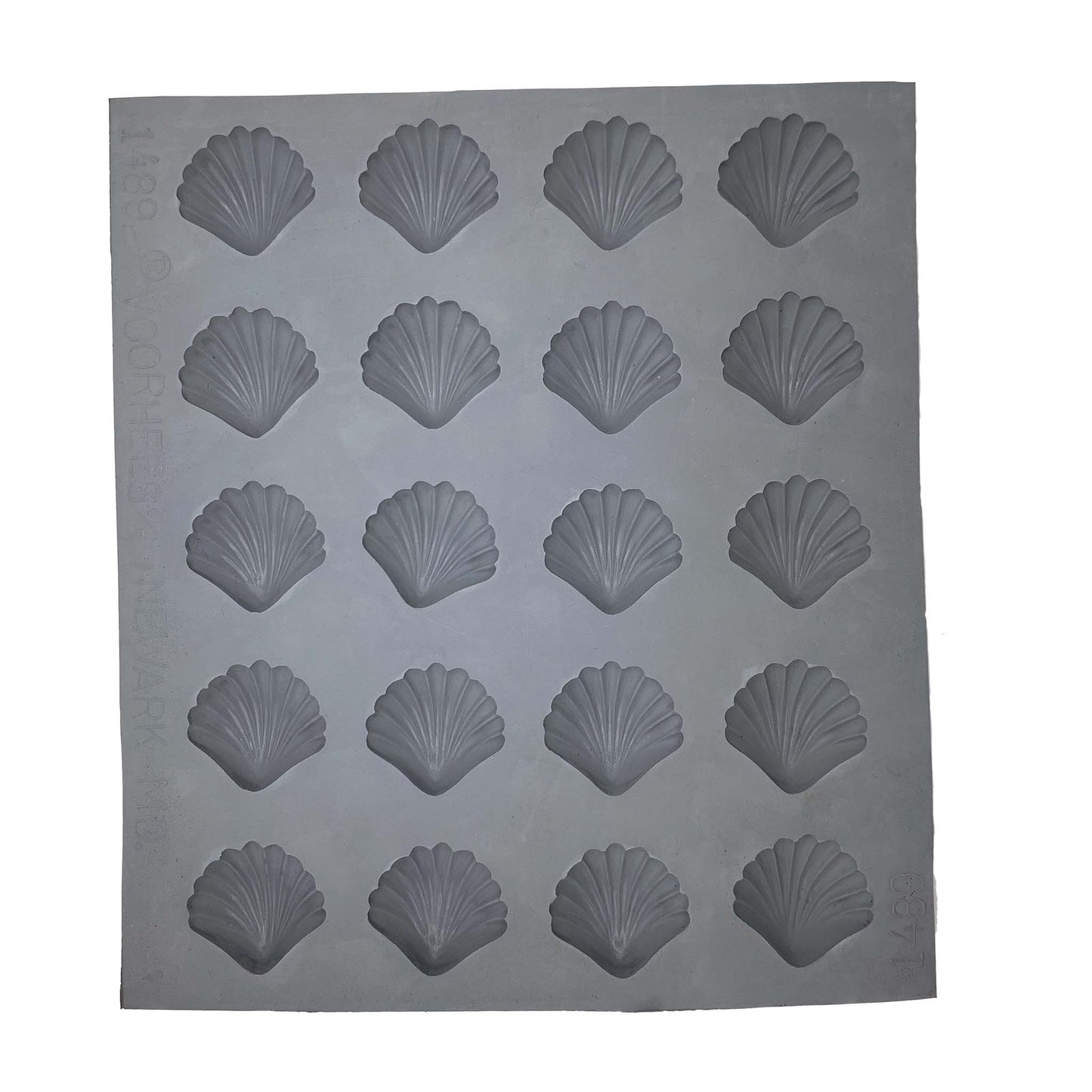 Full sheet of 20 shell-shaped rubber mint mold cavities arranged in a grid, used for crafting ocean-inspired sweets.
