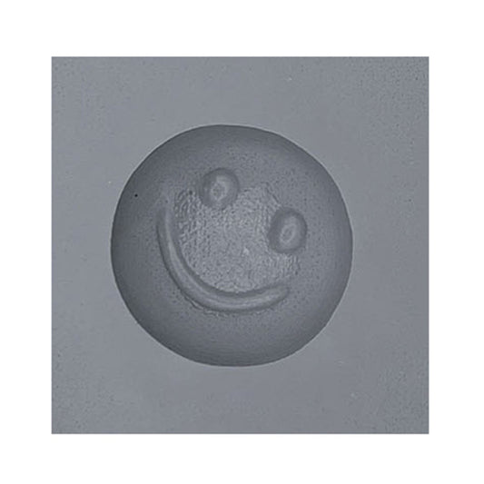 Close-up of smiley face rubber mint mold cavity for cheerful mint or chocolate shapes.