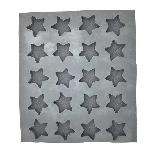 Full sheet of star rubber mint molds with multiple cavities for making festive treats