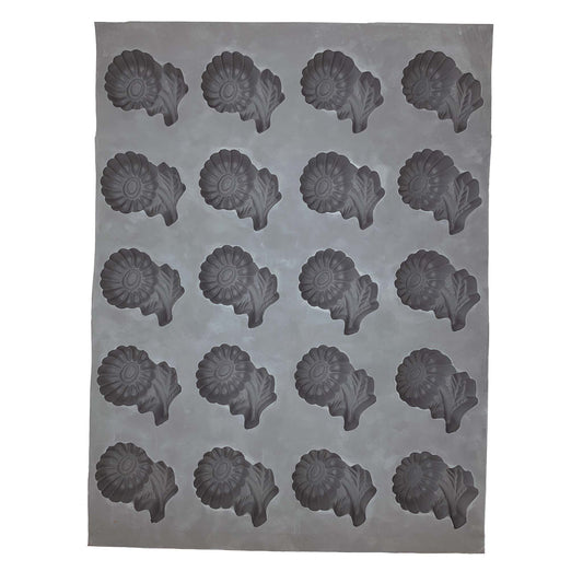 Full sheet of the Daisy with Stem and Leaf Rubber Mint Mold showing 20 floral cavities, ideal for crafting detailed daisy-shaped mints, chocolates, or decorative treats.