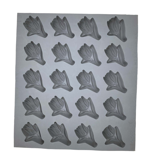 Full sheet of the Tulip Rubber Mint Mold featuring 20 tulip-shaped cavities, ideal for spring-themed candy making or decorative fondant projects.