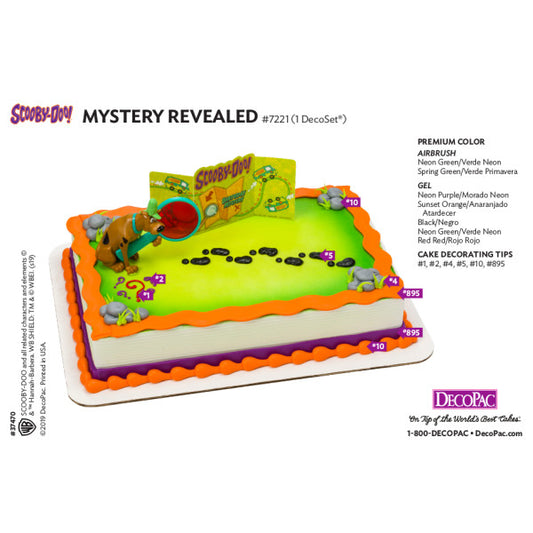 Product layout of the Scooby-Doo Cake Topper Decoset showing Scooby figurine, detective glass, and mystery map, along with cake decorating details.