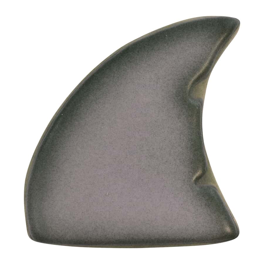 Decorated shark fin cookie with a smooth gray finish and realistic detailing.