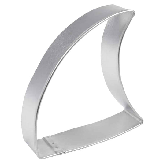 Side view of a sturdy shark fin cookie cutter with a curved edge.