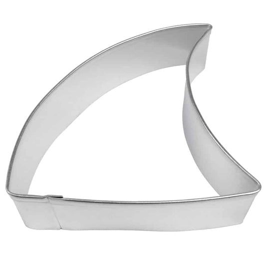 Metal shark fin-shaped cookie cutter, photographed from a top-down angle.