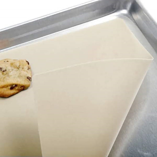 Silicone Baking Mat Laying on a Stainless steel cookie sheet