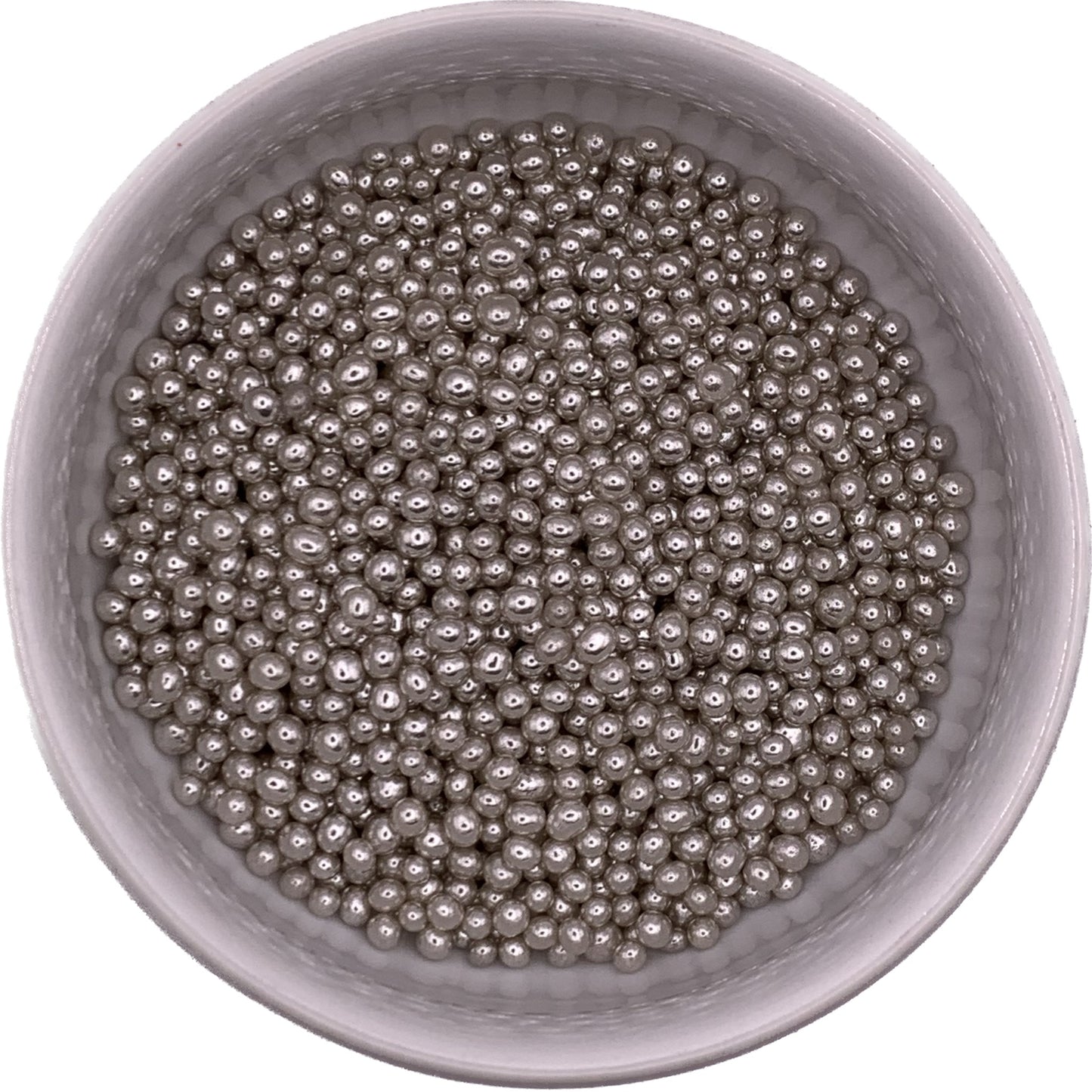 Close-up view of 3mm silver dragees in a white container, used as non-edible decorative accents for cakes, cookies, and confections.