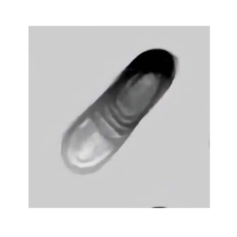 Close-up of a natural rubber mold shaped like a baby slipper or bootie, ideal for crafting cream cheese mints and baby shower-themed treats.