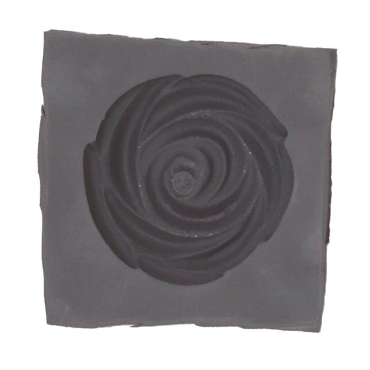 Close-up of single cavity from Small Rose Rubber Mint Mold showing layered rose petal detail