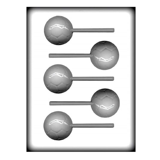 Image showcasing a white plastic hard candy mold designed to create soccer ball-shaped lollipops. The mold consists of four spherical cavities, each intricately detailed with the recognizable pentagon and hexagon pattern of a soccer ball. The cavities are arranged in a vertical line with the stick part of the mold extending from the side of each ball to create the lollipop handle. The shadows and highlights within the mold cavities suggest a three-dimensional depth to each design.