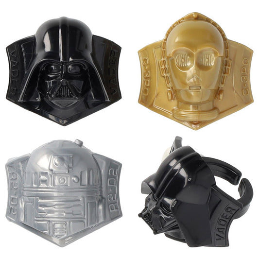 Close-up of STAR WARS™ character face rings featuring Darth Vader™, C-3PO™, and R2-D2™ in black, gold, and silver, shown from front and side angles.