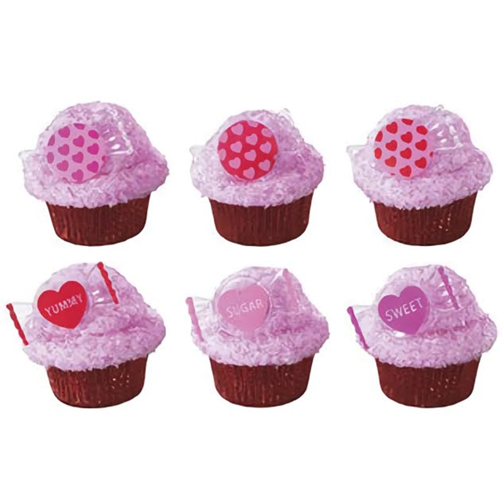 Hard Candy Shaped Cupcake Rings with the words Yummy, Sugar, and sweet written on them. Other have a several small hearts drawn on them.