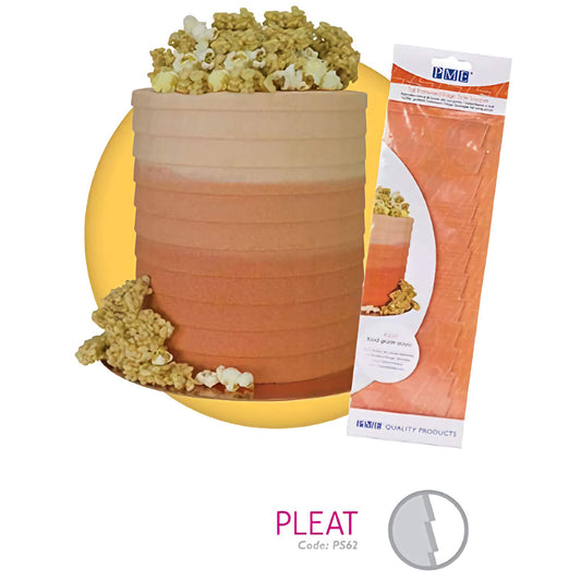 Image of a cake decorated using the PME tall patterned edge side scraper with a pleat design, code PS62. The cake features orange and brown gradient frosting with popcorn on top and around the base. The scraper packaging is shown on the right.