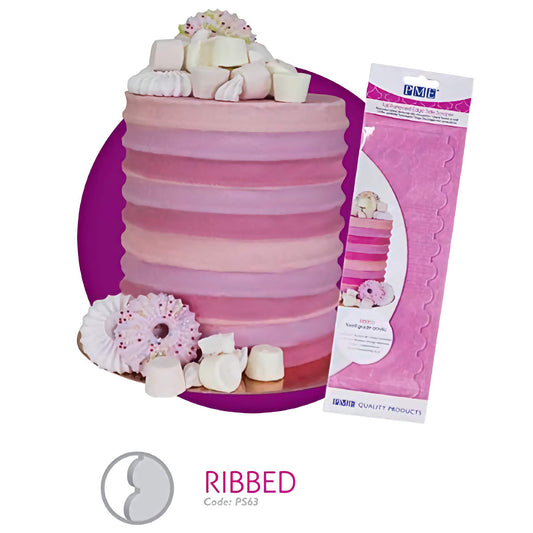 Image featuring a tall cake side scraper with a ribbed pattern by PME Quality Products, code PS63. The scraper is shown in its packaging, and beside it is a pink ombre cake with a ribbed texture on the sides, created using the scraper. The cake is topped with marshmallows and decorated with meringues and marshmallows at the base, presenting a delightful dessert display.