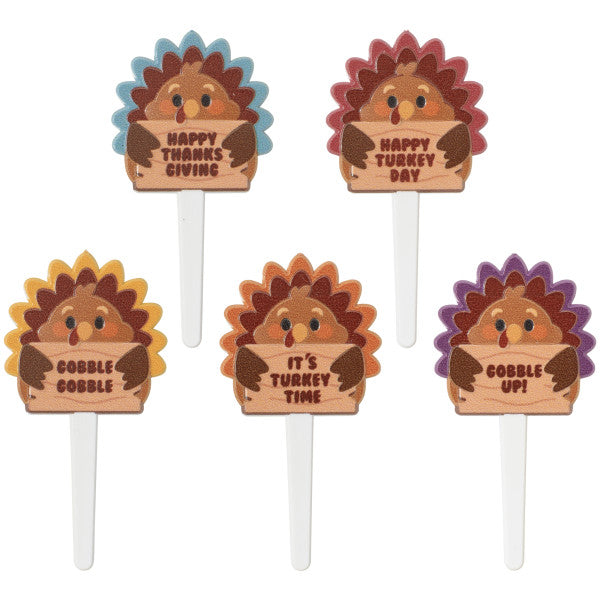 Set of five Thanksgiving turkey cupcake picks, each featuring a cute turkey holding a festive sign with fun sayings.